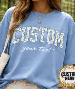 Custom Blue Floral Varsity Shirt, Personalized Flower Pattern Block Letter Tee, Aesthetic Cornflower Blue T-Shirt, Script Text Floral Top